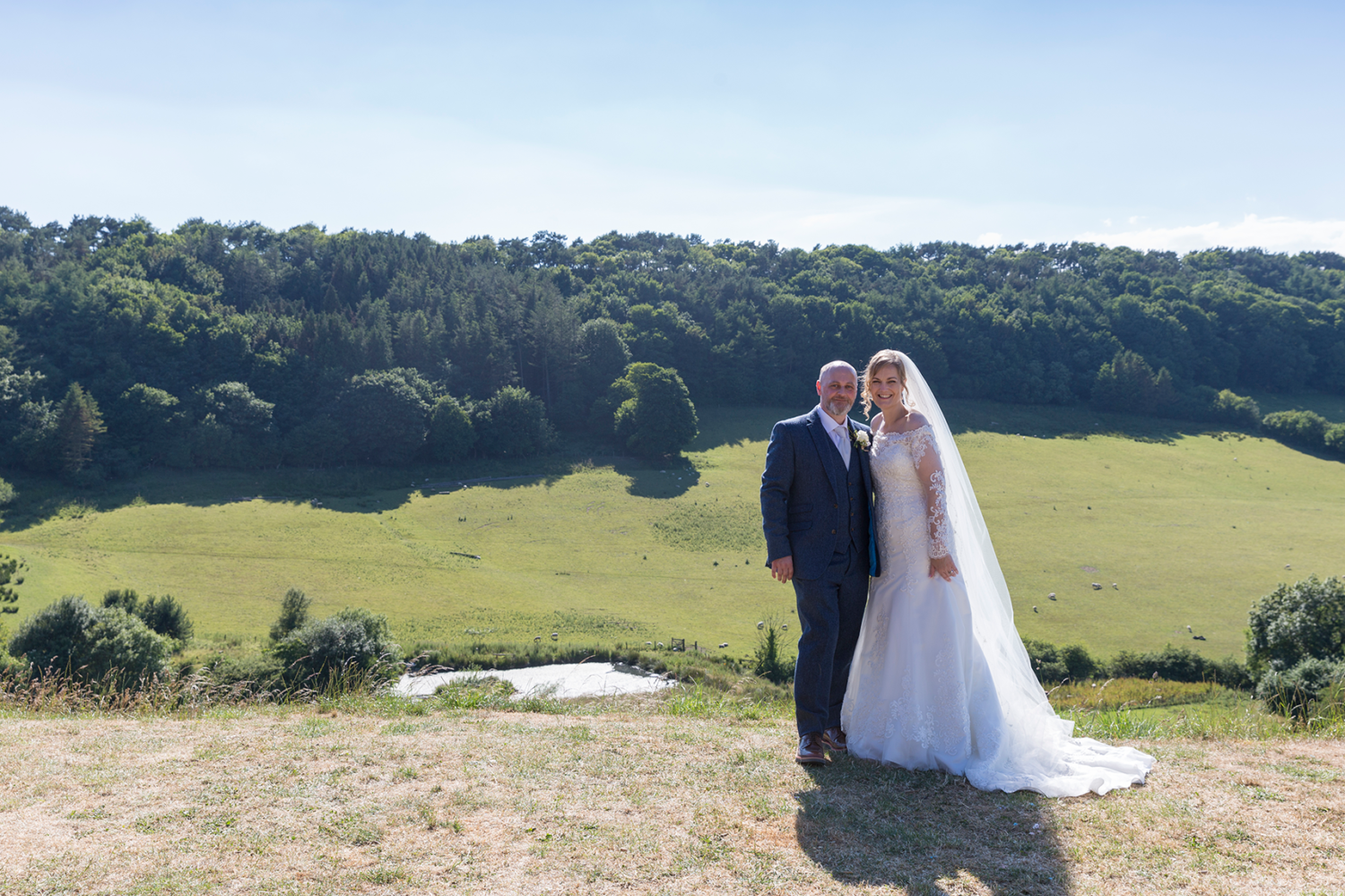 Couple shot with stunning scenery visable from Stepney Hill Farm
