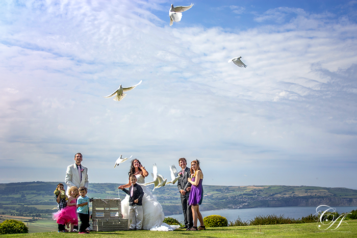 Dove release. Raven Hall Hotel Wedding Photography